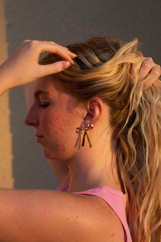 Golden bow earrings