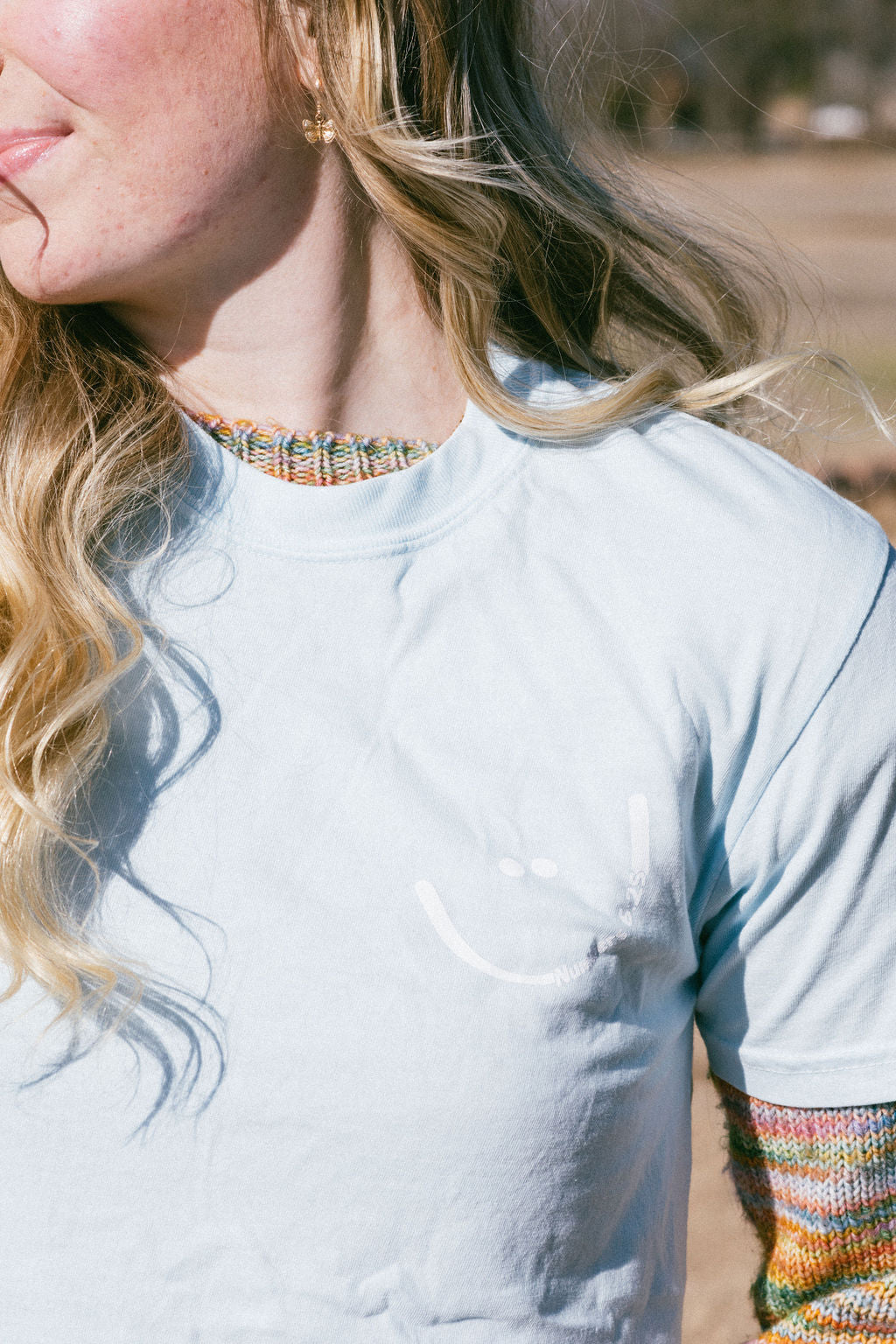When God thinks of you He smiles! Unisex T-shirt!